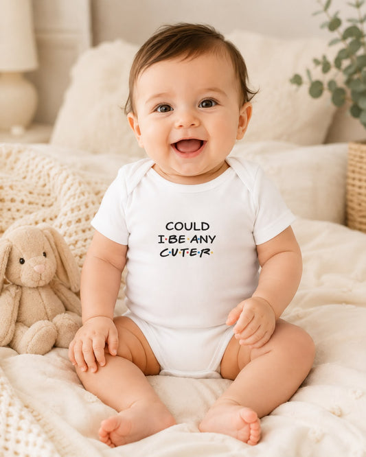 Could I Be Any Cuter baby bodysuit lifestyle photo, white, baby sitting on bed